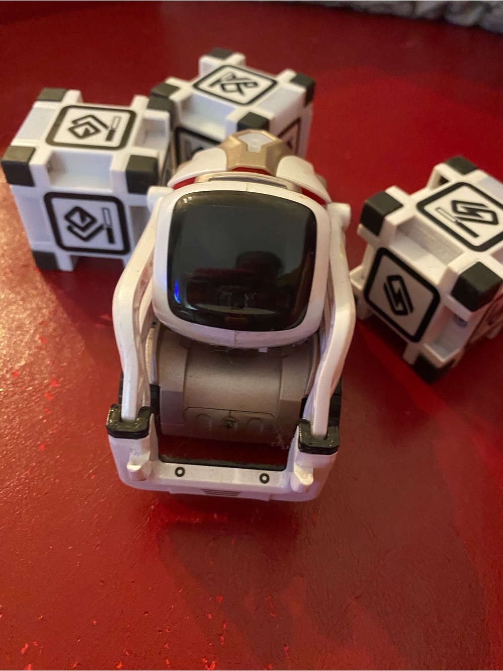 Cozmo Robot Toy - White and Black Interactive Companion with three cubes.